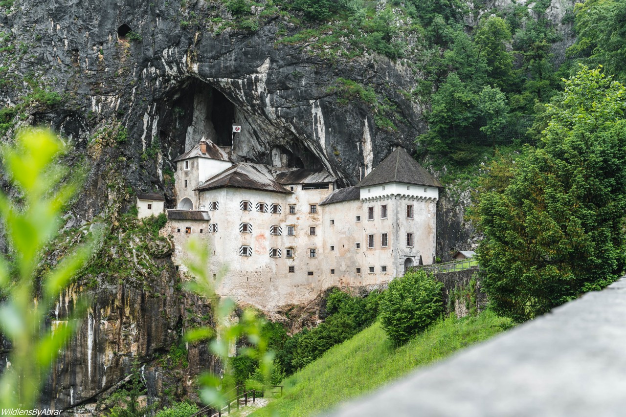 How to Visit the Dramatic Predjama Castle and Postojna Caves