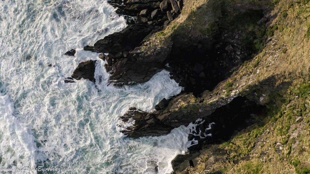 Waves crashing on rocks