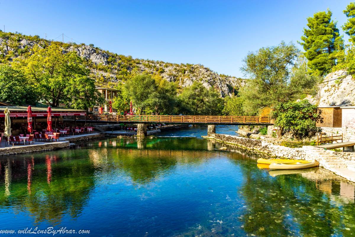 Bridge to cross the river to go to the viewpoint behind the restaurants