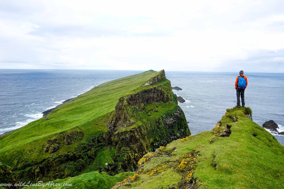 The trail has incredible views of the cliffs of Mykines island