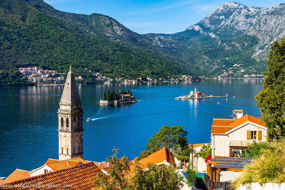 Postcard view of Perast Cathedral and the tiny islands of Sveti Dorde along with Our Lady of the Rocks