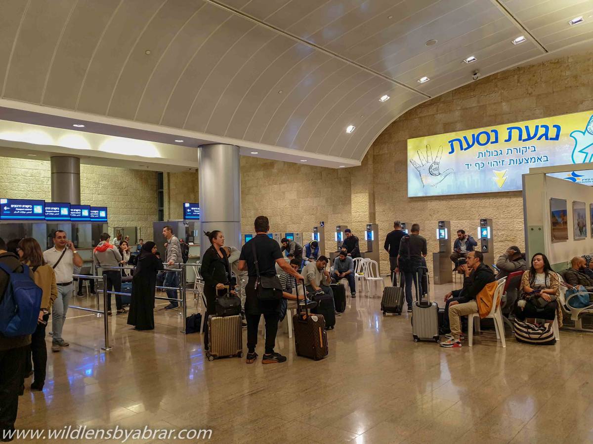 Visitors waiting for Immigration clearance at the Ben Gurion Airport