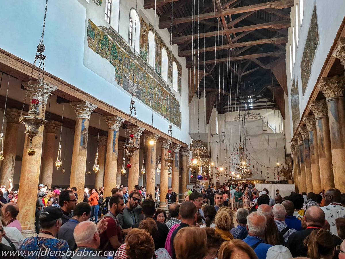 Crowds inside Church of Nativity in Bethlehem