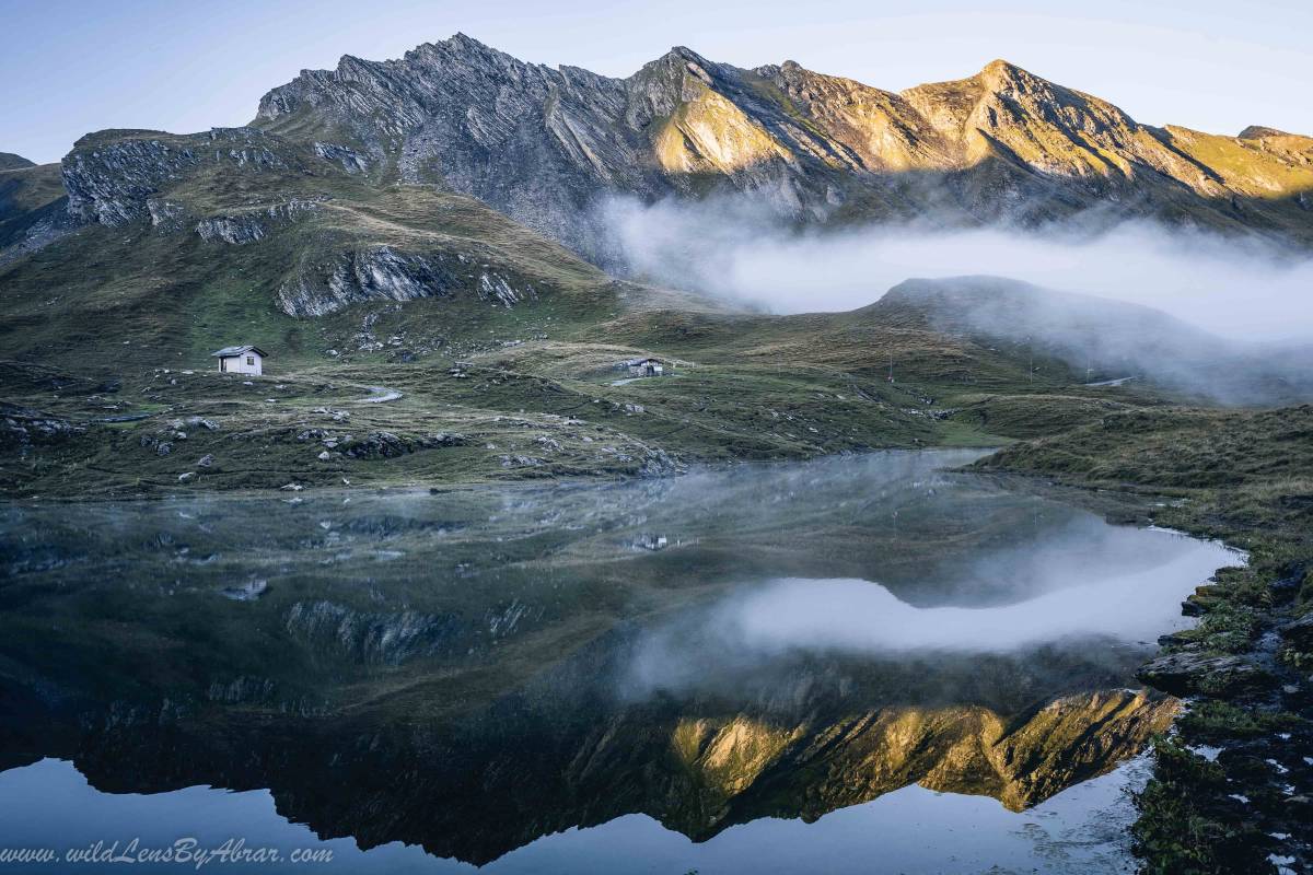 A stunning reflection of surrounding mountains in Bachalpsee