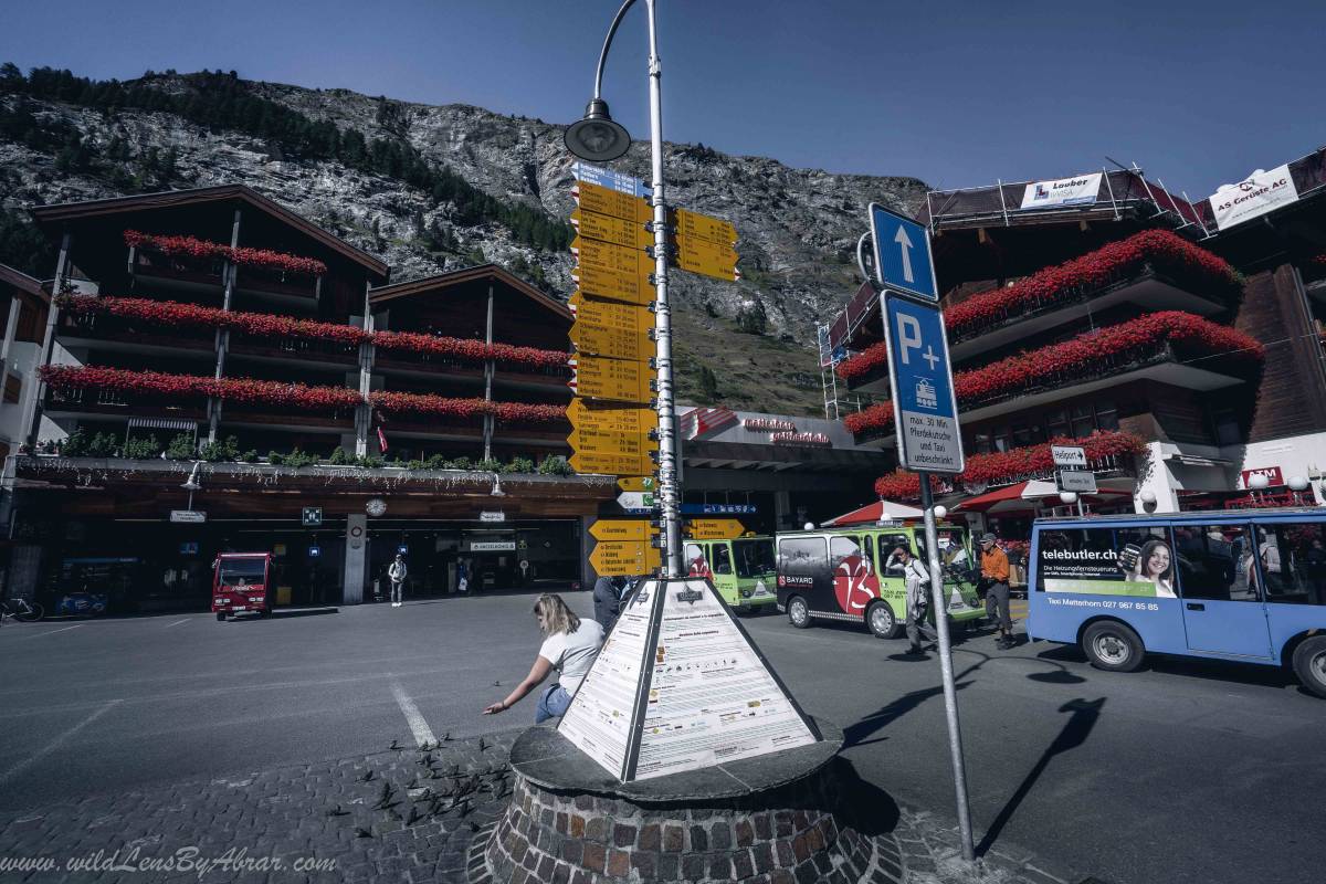 Direction and marking of different hiking trails in front of Zermatt Train Station